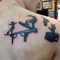 Small black ink scapular tattoo of awesome snowboarder