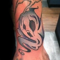 Small cartoon style colored ghost tattoo on hand
