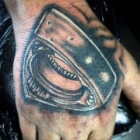 Small cool looking black ink engine part tattoo on hand