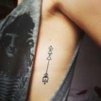 Small geometric arrow tattoo with trangles