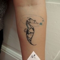 Small homemade style forearm tattoo of seahorse with ornaments