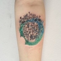 Small illustrative style colored forearm tattoo of various ornaments