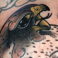 Small old school colored eagle head tattoo