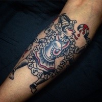 Small old school style colored arm tattoo of Hinduism monster