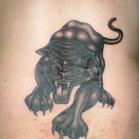 Snarling black panther tattoo