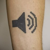 Sound symbol geek tattoo on arm