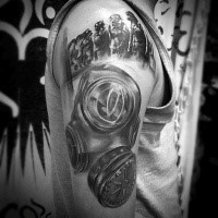 Spectacular 3D style very detailed shoulder tattoo of man in gas mask