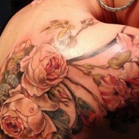 Spectacular colored massive half back tattoo of various flowers with leaves
