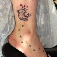 Spectacular for girls tattoo of cute cat with paw prints