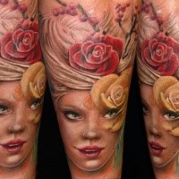 Spectacular looking colored arm tattoo of beautiful woman portrait