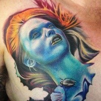 Spectacular looking colored chest tattoo of fantasy woman with bug