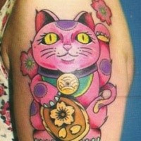 Spectacular multicolored shoulder tattoo of sweet painted maneki neko japanese lucky cat with flowers