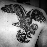 Spectacular nautical themed black and white back tattoo of detailed eagle with anchor and sea star