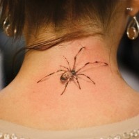 Spider tattoo on neck for girls