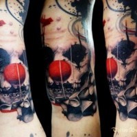 Spooky black clown with red nose tattoo