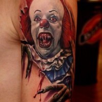Spooky clown skin rip tattoo by Hanz Pennywise