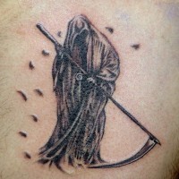 Spooky grim reaper with scythe tattoo