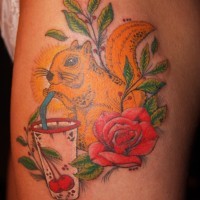 Squirrel tattoo drinking coctail with flowers