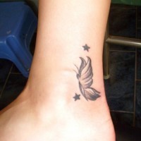 Stars and butterfly tattoos on ankle