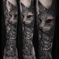 Stippling style black and white forearm tattoo of cool looking cat