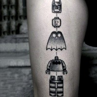 Stippling style black ink arm tattoo of Lego Batman