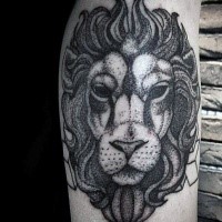 Stippling style black ink arm tattoo on lion head
