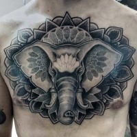 Stippling style black ink chest tattoo fo big elephant with leaves