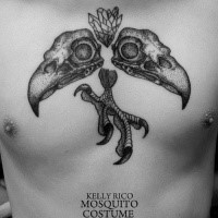 Stippling style black ink chest tattoo of eagle skulls with leg