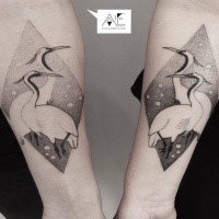 Stippling style black ink forearm tattoo of birds