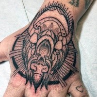 Stippling style black ink hand tattoo of bull with circle