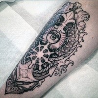 Stippling style black ink leg tattoo of steering wheel with anchor and eye