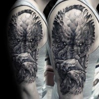 Stippling style black ink shoulder tattoo of creepy evil creature