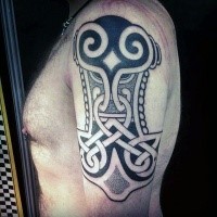 Stippling style black ink shoulder tattoo of big anchor