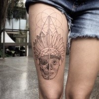 Stippling style black ink thigh tattoo of Indian face with geometrical ornaments