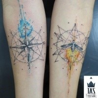 Stippling style colored forearm tattoo of nautical star and butterfly