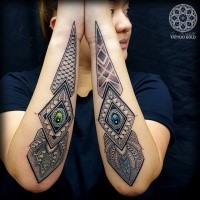 Stippling style colored forearm tattoo of interesting ornament with diamonds