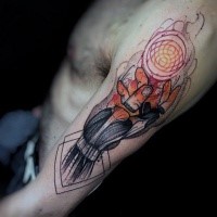 Stippling style colored human hand tattoo with glowing orb tattoo on shoulder
