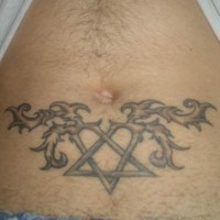 Stomach tattoo, two curled pins crossed, gray image
