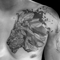 Stone like black ink chest tattoo of lion head