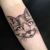 Stone like black ink forearm tattoo of dot style cat head