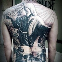 Stonework style black and white whole back tattoo of big statue with skulls