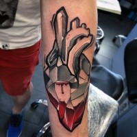 Stonework style colored forearm tattoo of human heart