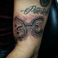 Stonework style cool looking arm tattoo of ancient symbol