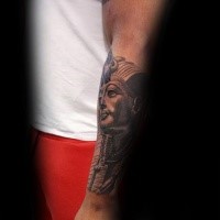 Stonework style creepy looking forearm tattoo Egypt statue