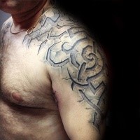 Stonework style detailed shoulder tattoo of ancient stone picture