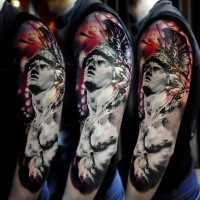 Stonework style detailed sleeve tattoo of ancient statue