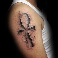 Stonework style incredible looking shoulder tattoo of ankh symbol