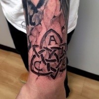 Stonework style interesting looking wrist tattoo of bird like symbol with letters