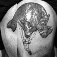 Strange designed black ink thigh tattoo of engraving style half fish half rhino balloon