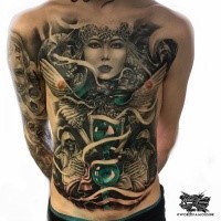 Strange looking colored chest and belly tattoo of woman with sand clock and skeletons